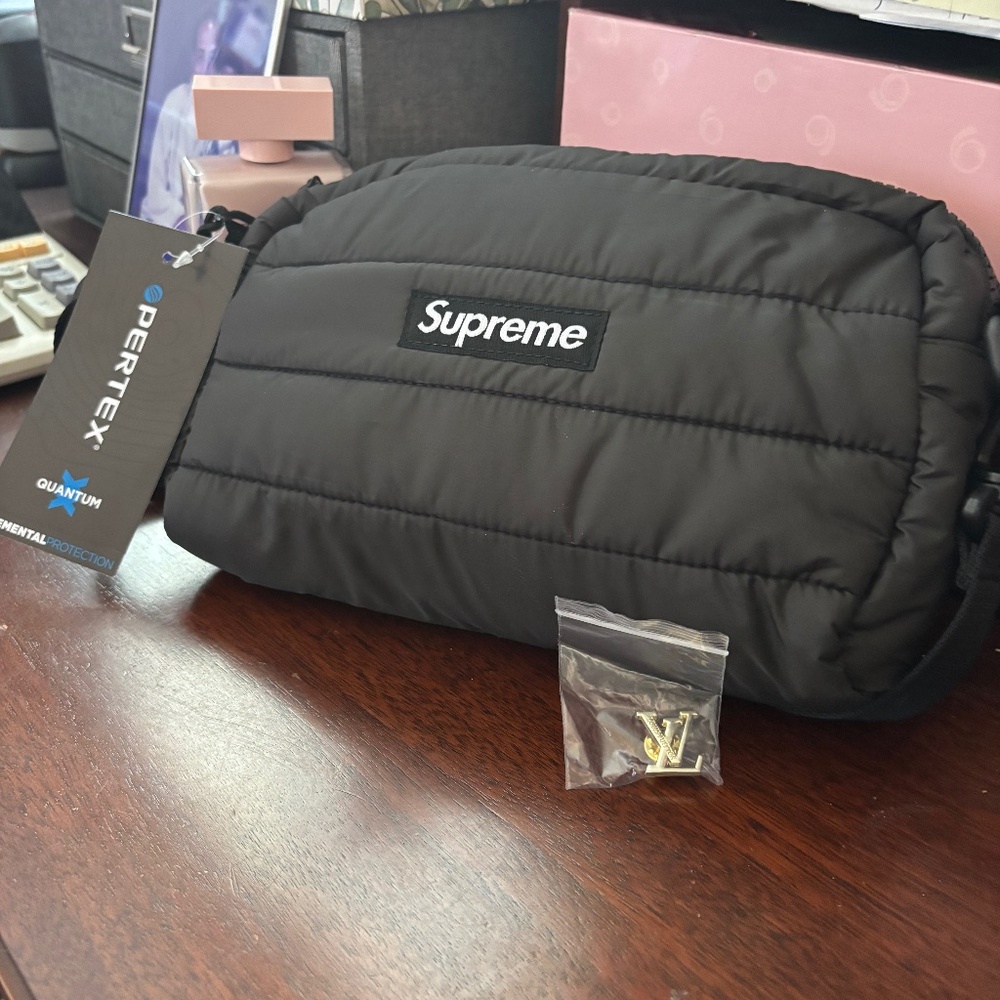 Supreme crossover puffer bag, with pin. New with tags.